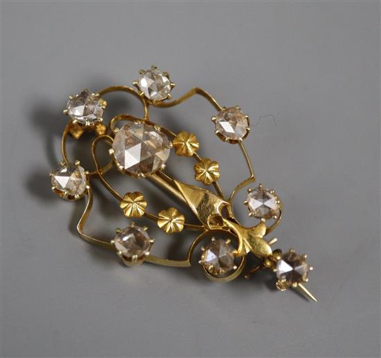 A yellow metal and rose cut diamond set openwork brooch, 31mm.